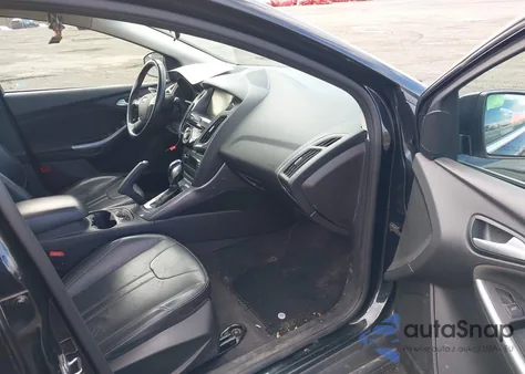 2014 Ford Focus Titanium z USA, uszkodzony, nr VIN 1FADP3N23EL462900